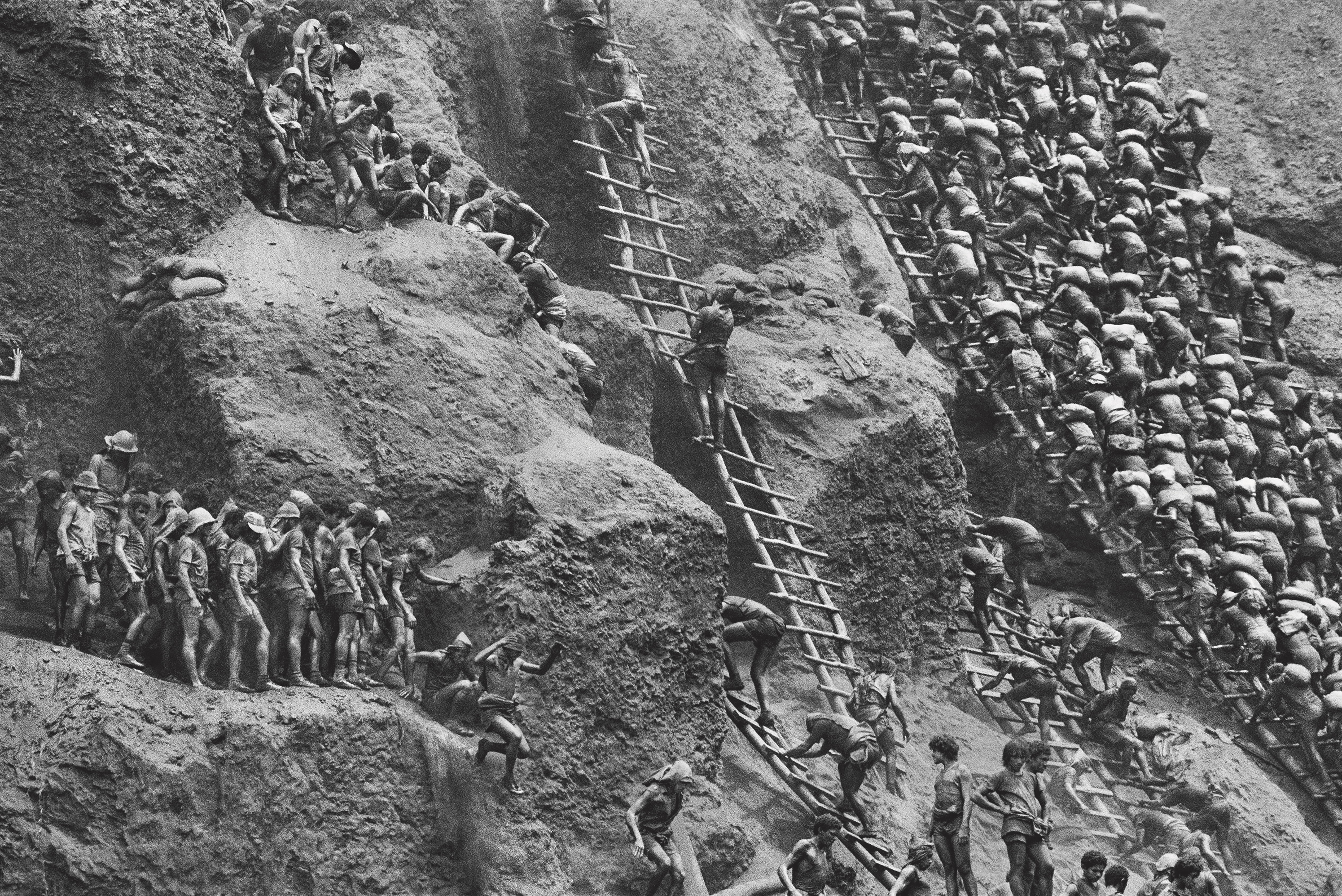 https://sothebys-com.brightspotcdn.com/6a/e5/03601a954e30a21c81a0b30350f3/sebastiao-salgado-goldmine-6.jpg