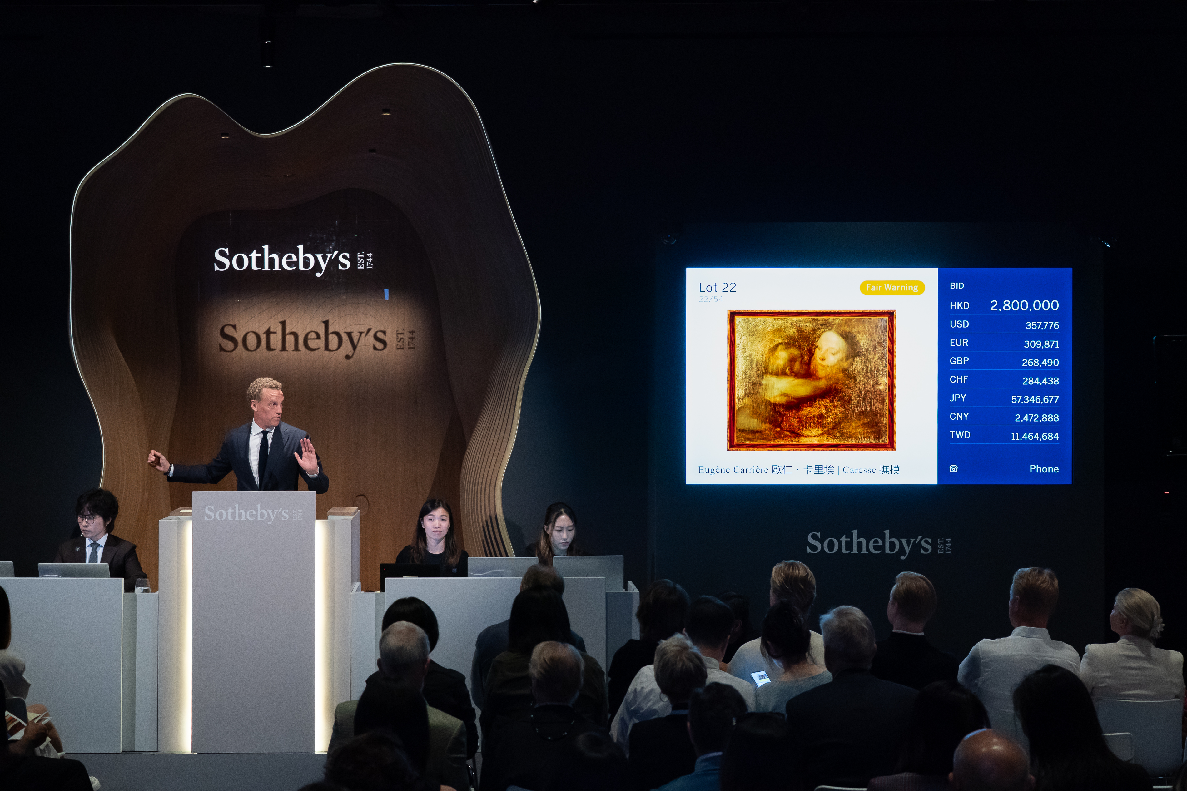https://sothebys-com.brightspotcdn.com/89/d7/d467b4194b5a8791b60cbb65865b/auction-scene-sothebys-modern-contemporary-evening-auction-eugene-carrieres-caresse.jpg