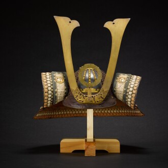 View 1 of Lot 4: A hoshi-bachi [helmet with standing rivets] and mempo [face mask] | Edo period, 17th century