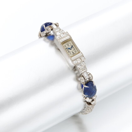 Catalog image of Platinum, diamond and sapphire bracelet watch , Cartier (Orologio bracciale in …