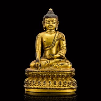 View 1 of Lot 105: A gilt-bronze figure of Shakyamuni Buddha Mark and period of Yongle | 明永樂 鎏金銅釋迦牟尼佛坐像 《大明永樂年施》款