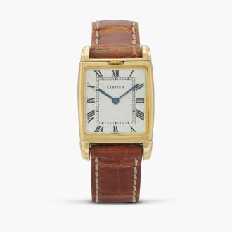 View 1 of Lot 235: Reverso | A yellow gold reversible dual time wristwatch |Circa 1970