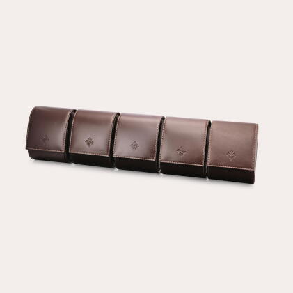 Catalog image of A set of 5 leather travelling pouches, Circa 2020
