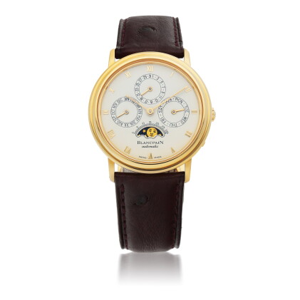 Catalog image of blancpain | yellow gold perpetual calendar wristwatch with moon phases circa 1995