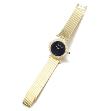 Catalog image of gerald genta & van cleef & arpels | gold, onyx and diamond wristwatch