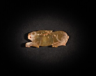 View 1 of Lot 80: A green jade 'rabbit' pendant, early Western Zhou dynasty | 西周初 玉雕兔形珮