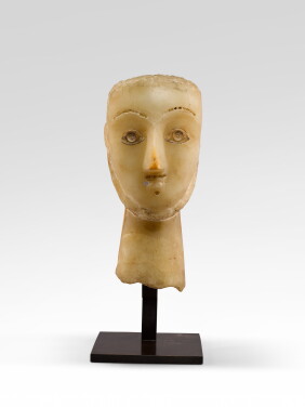 View 1 of Lot 145: A South Arabian Alabaster Head of a Man, Qataban, circa 3rd Century B.C/1st Century A.D.