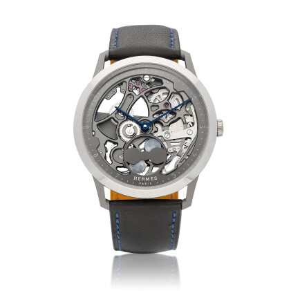 View 1 of Lot 1129: Slim d'Hermès Squelette Lune, Reference CA6.841, a platinum and titanium skeletonised automatic wristwatch, Circa 2023