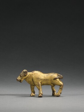 View 1 of Lot 70: A gilt-copper alloy figure of a yak, Nepal or Tibet, 15th/16th century | 十五/十六世紀 尼泊爾或西藏 鎏金銅合金牛