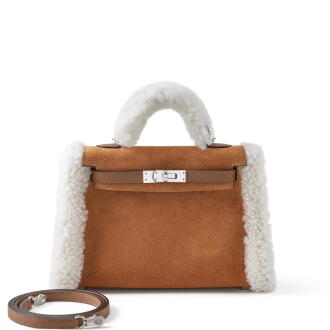 View 1 of Lot 10: Limited Edition Alezan Swift, Chamois Grizzly and Ecru Shearling Teddy Plush Mini Kelly II 20 Palladium Hardware,  2025