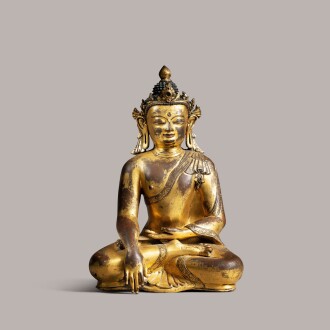 View 1 of Lot 332: Gilt copper Buddha Shakyamuni with inset stones Nepal, Early Malla Period (c. 1200-1482) 14th/15th century | 尼泊爾 十四/十五世紀 鎏銅合金佛坐像