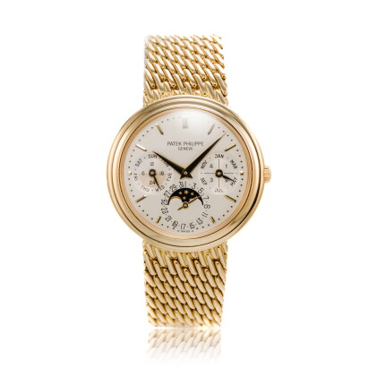 Catalog image of Reference 3945 | A yellow gold automatic perpetual calendar moon phase bracelet…