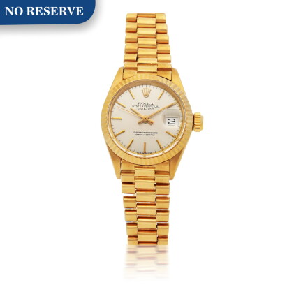 Catalog image of rolex | datejust, ref 6917 yellow gold wristwatch with date and bracelet circa 1973