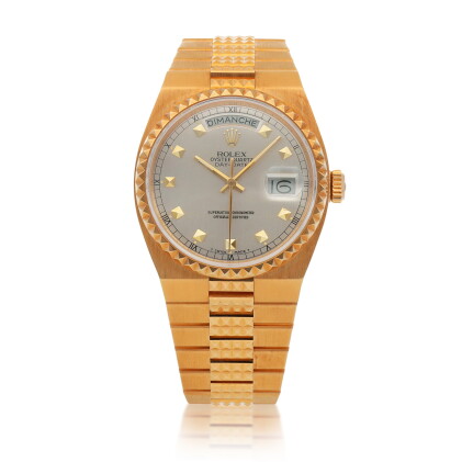 Catalog image of Oysterquartz Day-Date, Ref. 19028 Yellow gold wristwatch with day, date and 'Py…