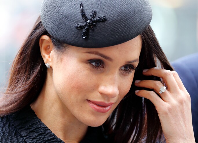 Meghan Markle wearing her cushion cut engagement ring.