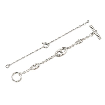 View 1 of Lot 1127: Set of Two White Gold and Diamond Finesse Bracelet and Sterling Silver Farandole Bracelet