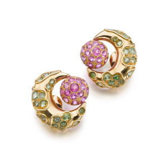 View 1 of Lot 329: Pair of peridot and pink sapphire ear clips, circa 1965
