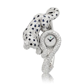View 1 of Lot 2248: Panthére, Reference 315AF | A white gold, diamond, sapphire and emerald-set bangle watch, Circa 2011 | 卡地亞 | Panthére 型號315AF | 白金鑲鑽石、藍寶石及綠寶石手鐲腕錶，約2011年製