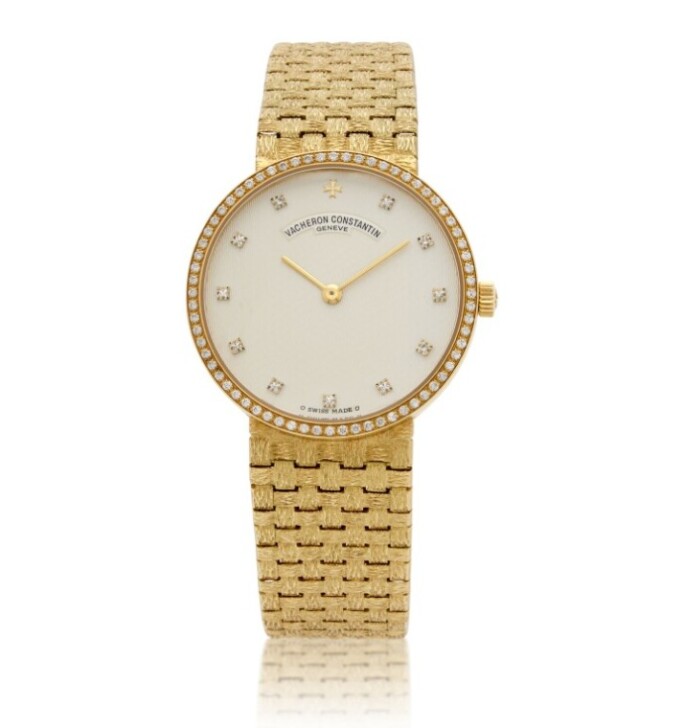 Vacheron Constantin Patrimony Traditionnelle Boutique Edition wristwatch in yellow gold with a silvered guilloché dial, diamond hour markers, and rare gold basket-weave integrated bracelet.