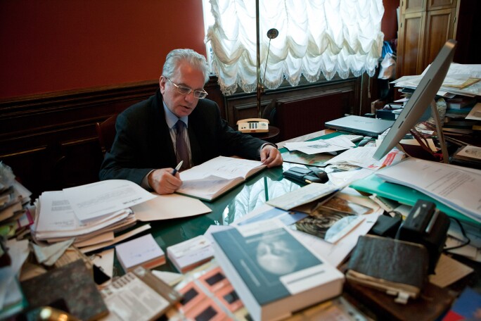 Mikhail Piotrovsky, Director at the Hermitage Museum sits at his desk in St. Petersburg