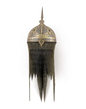 View 1 of Lot 137: A gold and silver-overlaid steel helmet (kulah khud) with grape vines, Persia, Qajar, 19th century