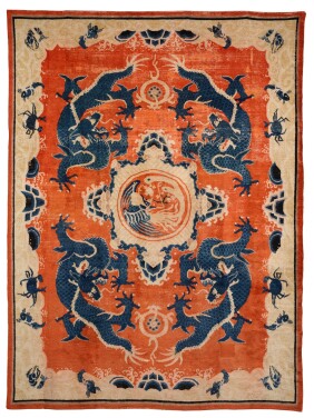 View 1 of Lot 143: A very large orange-ground 'dragons and phoenix' wool carpet China-Tibet, 19th century | 藏傳 十九世紀 杏地龍鳳呈祥紋羊絨地毯