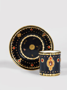 View 1 of Lot 343: A Sèvres Porcelain  'Jeweled' Black-Ground 'Dauphin' Cup and Saucer (Gobelet litron et soucoupe), circa 1781