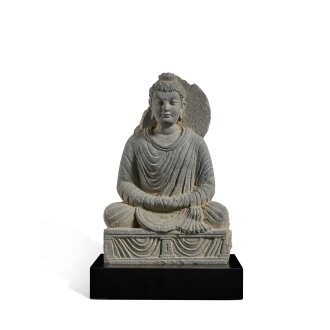 View 1 of Lot 143: A gray schist figure of seated Buddha, Ancient region of Gandhara, 3rd / 4th century