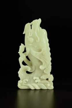 View 1 of Lot 210: A rare yellow jade 'dragon-carp' vase, Qing dynasty, Qianlong period | 清乾隆 黃玉魚龍形花插