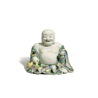 View 1 of Lot 78: A famille-verte biscuit figure of Budai Qing dynasty, Kangxi period | 清康熙 素三彩布袋和尚坐像