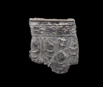 View 1 of Lot 119: A Roman Lead Sarcophagus Fragment, circa late 2nd/mid 3rd Century A.D.