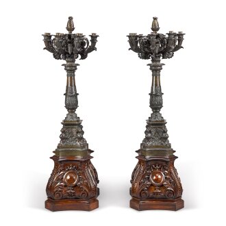 View 1 of Lot 84: A pair of large Louis Philippe patinated bronze eight-light candelabra, circa 1832, attributed to Jean-François Denière