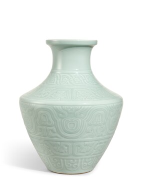 View 1 of Lot 1117: A fine and rare celadon-glazed archaistic vase, hu, Seal mark and period of Qianlong | 清乾隆　粉青釉仿古獸面波曲紋盤口尊　《大清乾隆年製》款