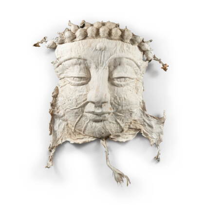 Catalog image of Cowskin Buddha Face no. 12