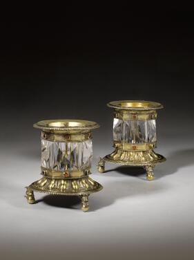 View 1 of Lot 504: A pair of Flemish silver-gilt mounted rock crystal salts, Bruges, 1574/75, maker's mark a figure seated backwards on a horse