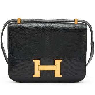 View 1 of Lot 67: Vintage Black Shiny Lizard Constance 23 Gold Hardware, 1960s