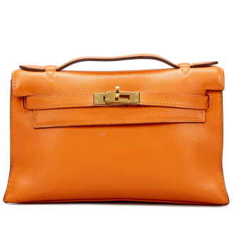 View 1 of Lot 22: Orange H Swift Kelly Pochette Gold Hardware, 2010