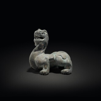 View 1 of Lot 607: A bronze 'mythical beast' weight, Ming dynasty | 明 銅瑞獸形鎮