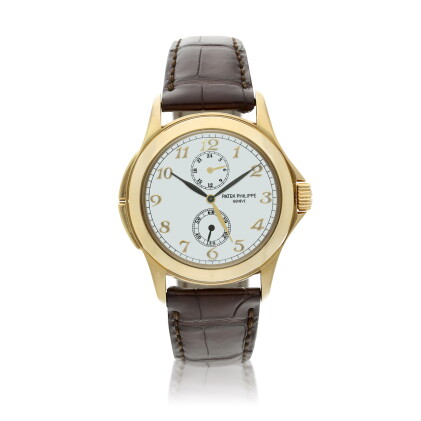 Catalog image of Reference 5134 A yellow gold dual time wristwatch with 24-hour indication, Circa 2003