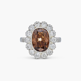 View 1 of Lot 3: Fancy Dark Orangy Brown Diamond and Diamond Ring