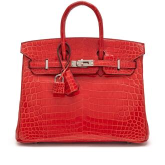 View 1 of Lot 64: Orange Poppy Shiny Niloticus Crocodile Birkin 25 Palladium Hardware, 2013