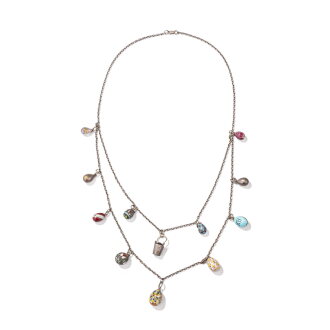 View 1 of Lot 718: Collier avec douze oeufs miniatures en argent et émail, par divers orfèvres, Russie, vers 1900