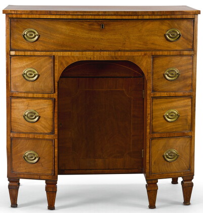 Catalog image of a george iii boxwood strung and crossbanded mahogany bow-front kneehole desk, c…