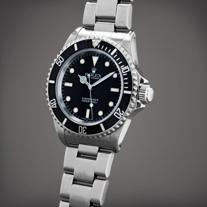 Catalog image of Submariner, Reference 14060 | A stainless steel wristwatch with bracelet | Circa 1991