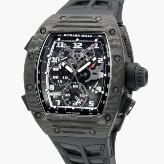 View 1 of Lot 179: Reference RM004-V3 CA | A limited edition NTPT Carbon semi-skeletonised split-second chronograph wristwatch with  adjustable clutch rocker, Grade 5 titanium bridges, power reserve and torque indication | Circa 2018