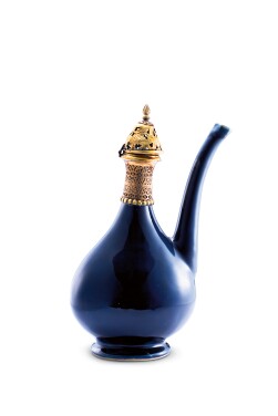 View 1 of Lot 9727: A gilt-copper mounted blue-glazed ewer | 藍釉鎏金銅鑲口軍持