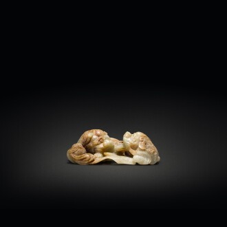 View 1 of Lot 530: A celadon and russet jade 'Buddhist lion' group, Ming dynasty | 明 青玉雕太獅少獅