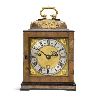 View 1 of Lot 28: A small olivewood table clock, Henry Jones, London, circa 1690 and later, case, dial and movement associated