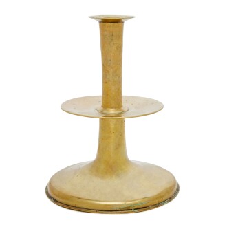 View 1 of Lot 55: A Fine and Rare English Cast Brass Mid-Drip 'Trumpet' Candlestick, Circa 1650