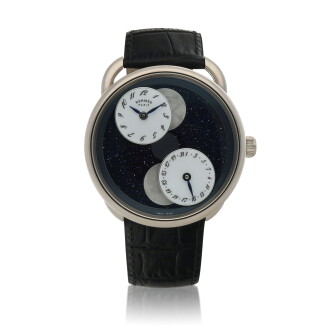 View 1 of Lot 31: Arceau L'Heure De La Lune, Ref. AR1.890a, Limited edition white gold wristwatch with mother-of-pearl double moon phases and date Circa 2019 | 愛馬仕 | AR1.890a型號「Arceau L'Heure De La Lune」限量版白金腕錶備珠母貝雙月相及日期顯示，約2019年製